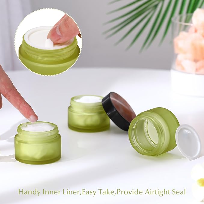 Domensi 100 Pcs 1oz Glass Jars with Lids Bulk Small Glass Salve Tins Cream Container Cosmetic Jars for Travel Balm with Inner Liners for Sample Cream (Bean Green,Black Lids,Plastic Lid)