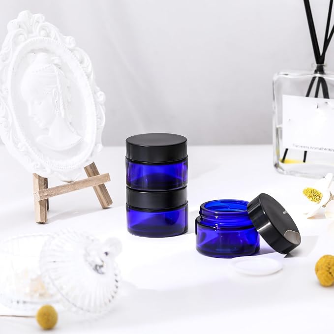Domensi 60 Pcs 1oz Glass Jars with Lids Bulk Small Glass Salve Tins Cream Container Cosmetic Jars for Travel Balm with Inner Liners for Sample Cream (Cobalt Blue,Black Lid,Plastic Lid)