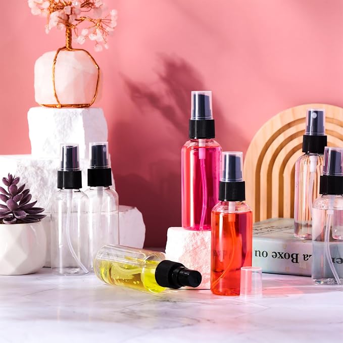 Roshtia 50 Pcs 2 oz Plastic Mini Spray Bottles with Black Cap Clear Empty Fine Mist Spray Bottles Refillable Liquid Container for Essential Oils Perfumes Travel Makeup