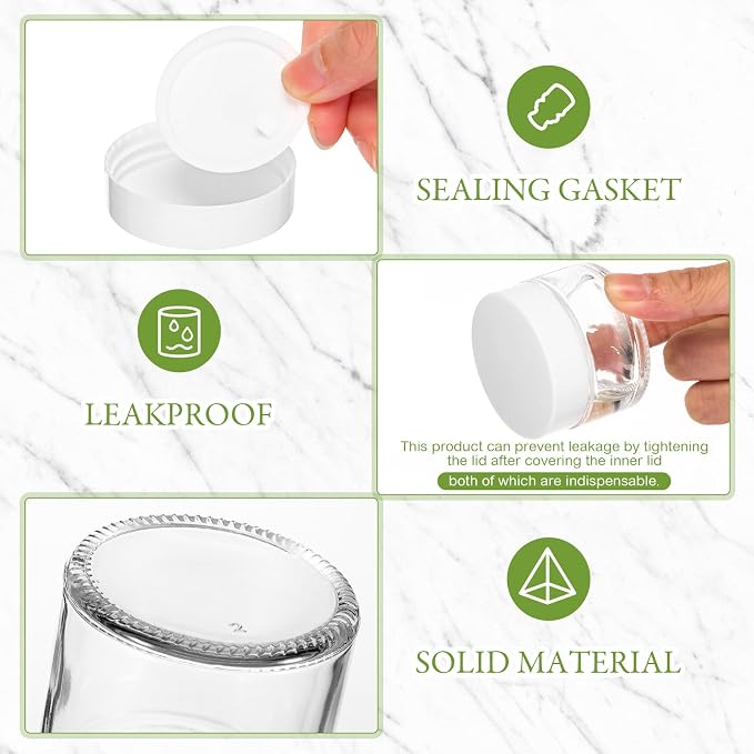 Domensi 100 Pcs 1oz Glass Jars with Lids Bulk Small Glass Salve Tins Cream Container Cosmetic Jars for Travel Balm with Inner Liners for Sample Cream (Clear,White Lid,Plastic Lid)