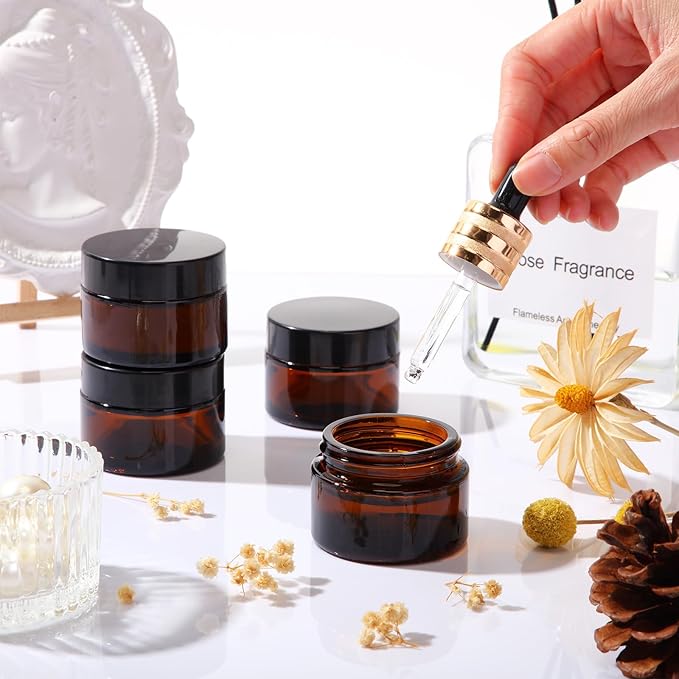 Domensi 60 Pcs 1oz Glass Jars with Lids Bulk Small Glass Salve Tins Cream Container Cosmetic Jars for Travel Balm with Inner Liners for Sample Cream (Amber,Black Lid,Plastic Lid)