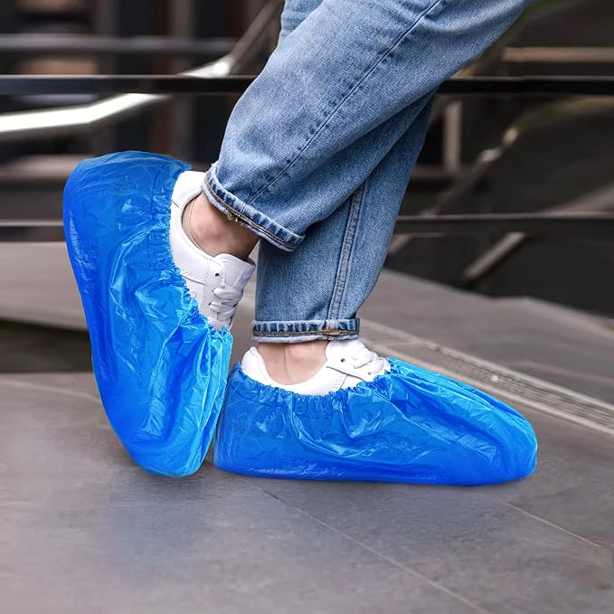 EZGOODZ Blue Disposable Shoe Covers for Indoors/Outdoors, 16 x 6 Inch. Pack of 100 (50 Pairs) Waterproof Disposable Boot Covers. Thick CPE Booties to Cover Shoes with Elastic Ankle Band