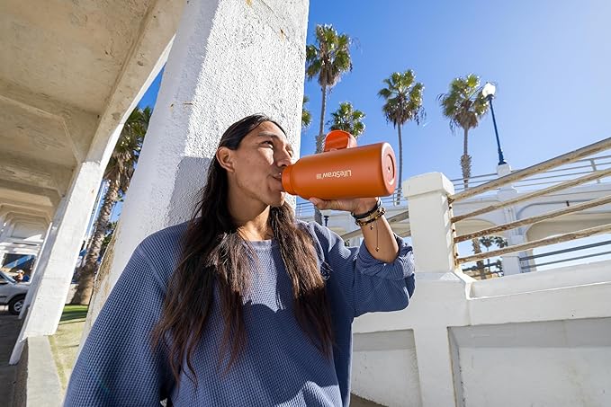 LifeStraw Go Series — Insulated Stainless Steel Water Filter Bottle for Travel and Everyday Use removes Bacteria, Parasites and Microplastics, Improves Taste, 1L, Orchid Pink
